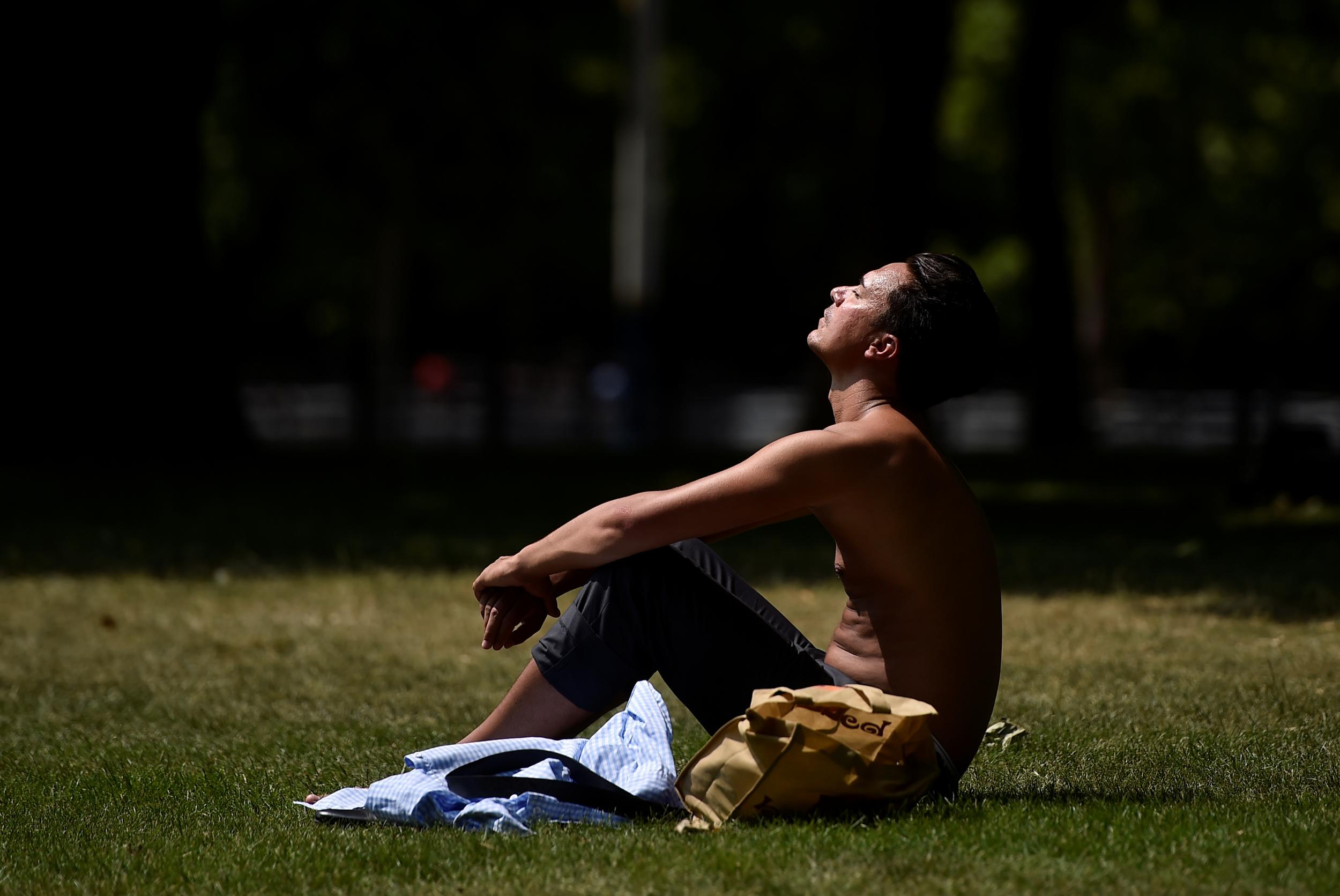 A worker enjoys the sun in London