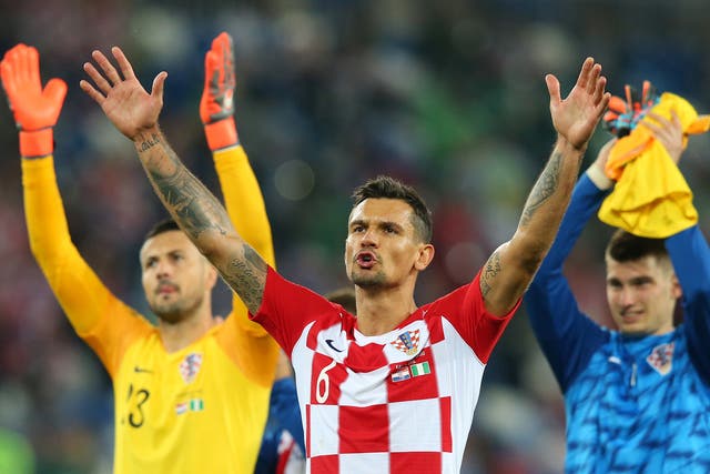 Dejan Lovren of Croatia celebrates with fans following his side's victory over Nigeria