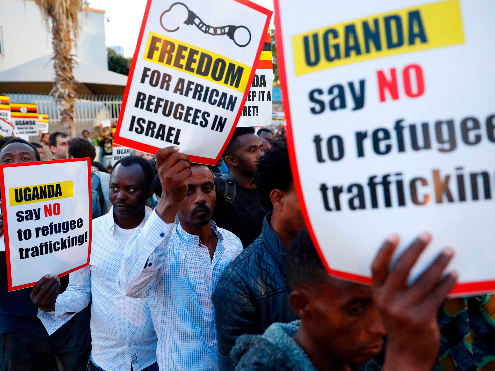 African migrants and Israelis demonstrate in Tel Aviv on April 9, 2018 against the Israeli government's policy to forcibly deport African refugees and asylum seekers.