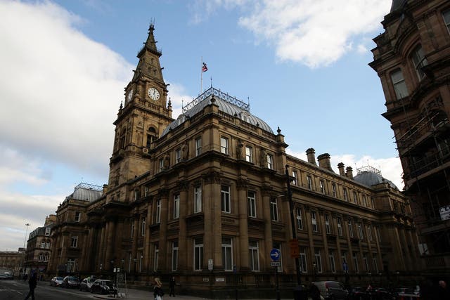 Liverpool's Grade II-listed Municipal Building was sold at a time when the council said it needed to find £90m savings because of central government cuts 
