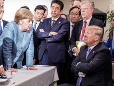 Trump 'threw two Starburst' towards Angela Merkel at G7 summit