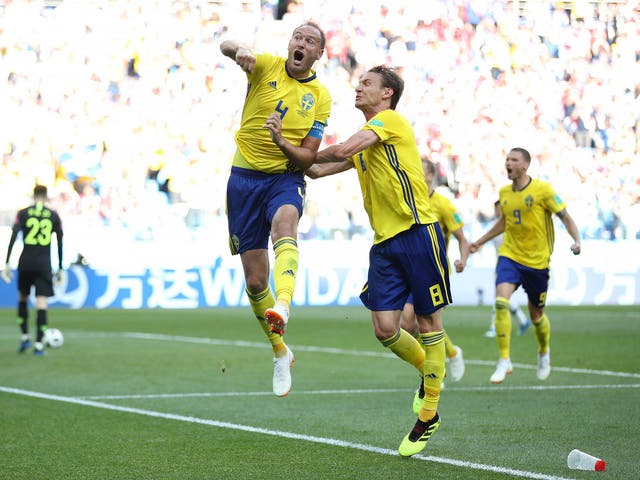 Andreas Granqvist punches the air in delight after scoring the winning goal for Sweden against South Korea