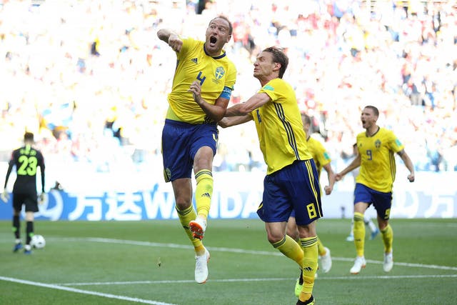 Andreas Granqvist punches the air in delight after scoring the winning goal for Sweden against South Korea