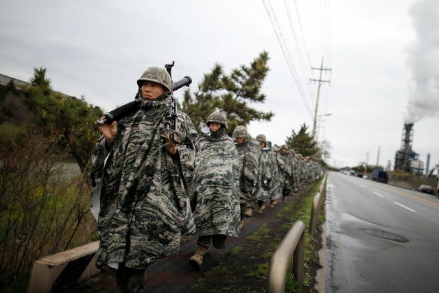 South Korean marines march during a military exercise as a part of an annual joint military training called Foal Eagle between South Korea and the US in Pohang, South Korea