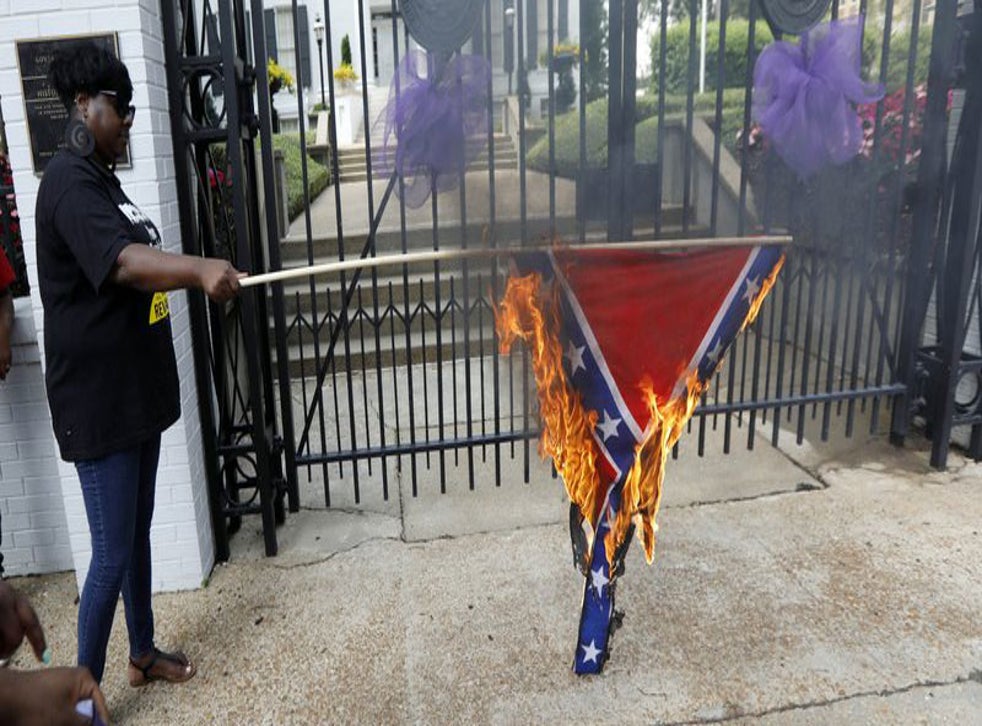 Protesters burn Mississippi flag for 'symbolising racism' indy100