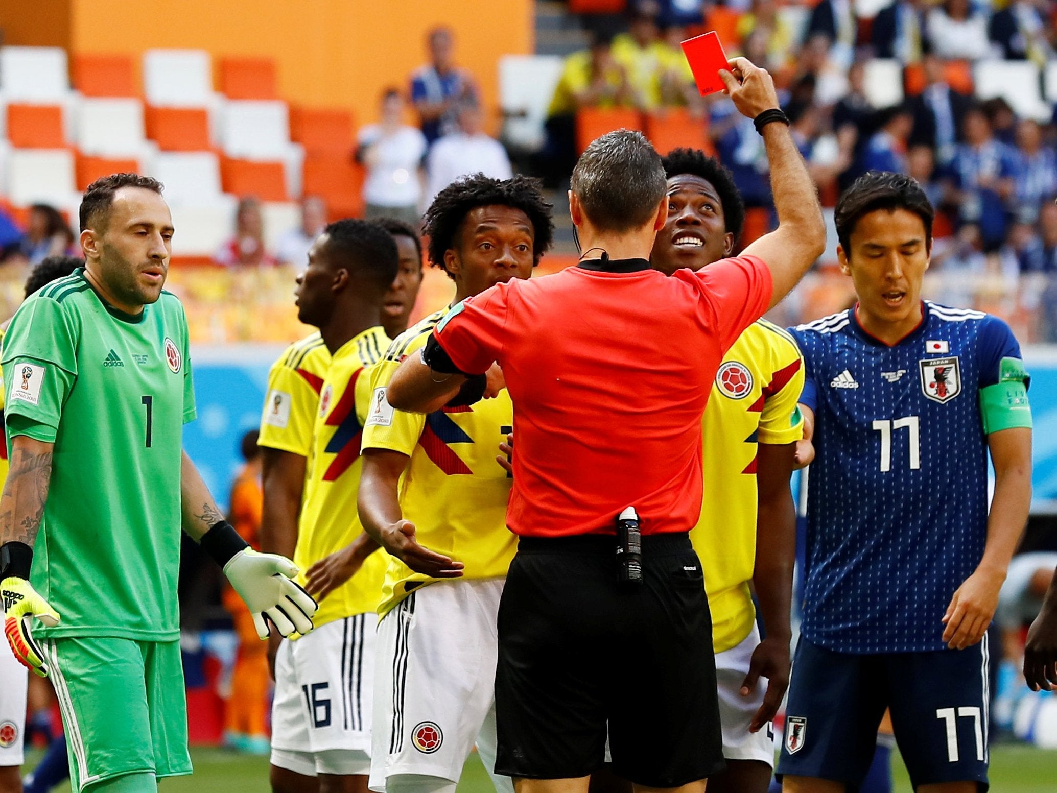 Referee Damir Skomina sends off Carlos Sanchez (Reuters)