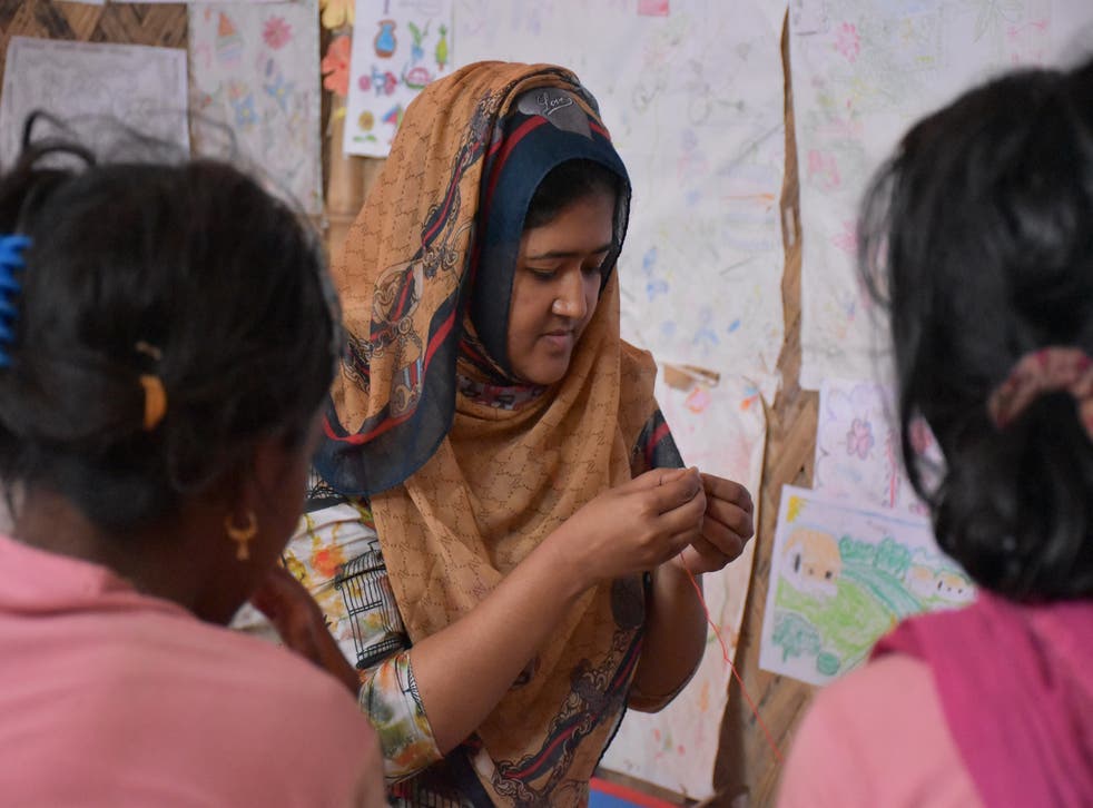 Rohingya women and girls are taught sewing, play games, receive medical care and are offered counselling at women-only centres run by charities like IRC in Cox's Bazar