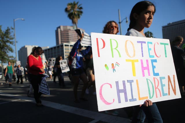 Protestors march against the separation of migrant children from their families