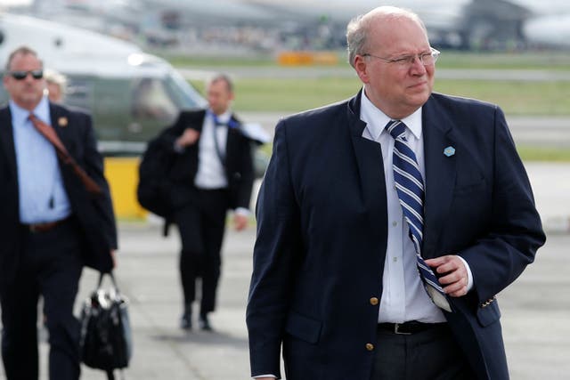White House deputy chief of staff for operations Joe Hagin prepares to board Air Force One to return home with Donald Trump fro Manila, Philippines