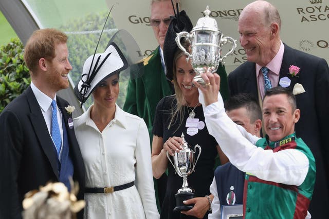 Dettori was presented with the trophy by the Duke and Duchess of Sussex after winning on Without Parole