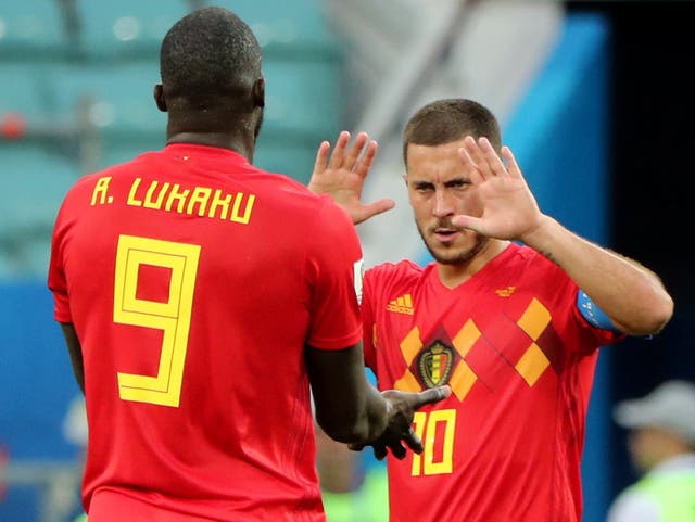 Belgium's Eden Hazard and Romelu Lukaku celebrate after the match