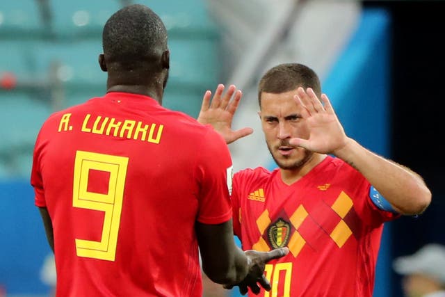 Belgium's Eden Hazard and Romelu Lukaku celebrate after the match