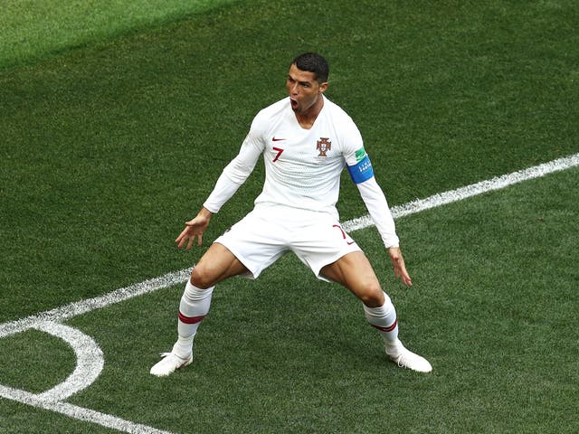 Cristiano Ronaldo celebrates after scoring his team's first goal