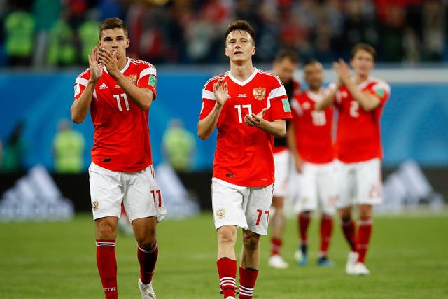 Aleksandr Golovin (right) has run further so far in the World Cup than any other player