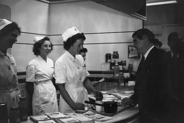 Minister of Health Aneurin Bevan jokes with nurses in 1947