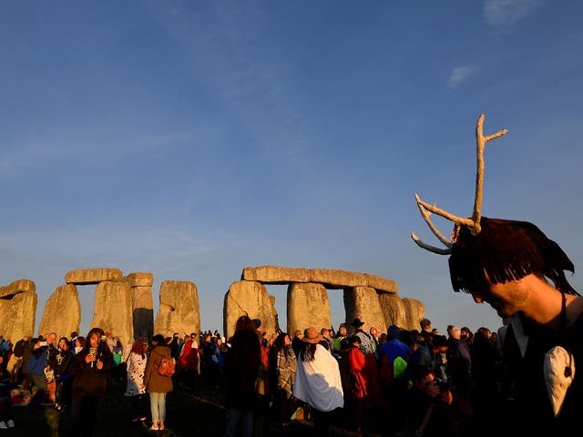 Crowds welcome in the Summer Solstice at Stonehenge stone circle on 21 June 2018