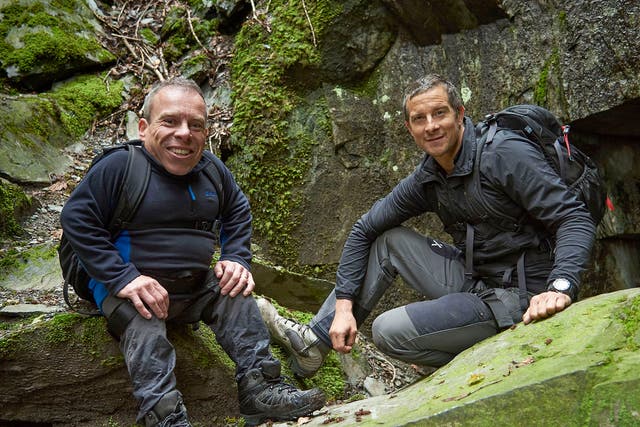 Davis (left) gets put through some gruelling physical challenges by Bear Grylls on the hills of the Lake District