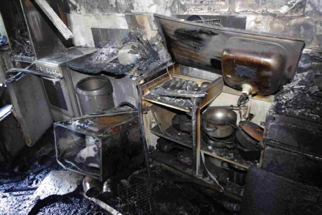 Fire experts say the blaze started in Behailu Kebede's kitchen