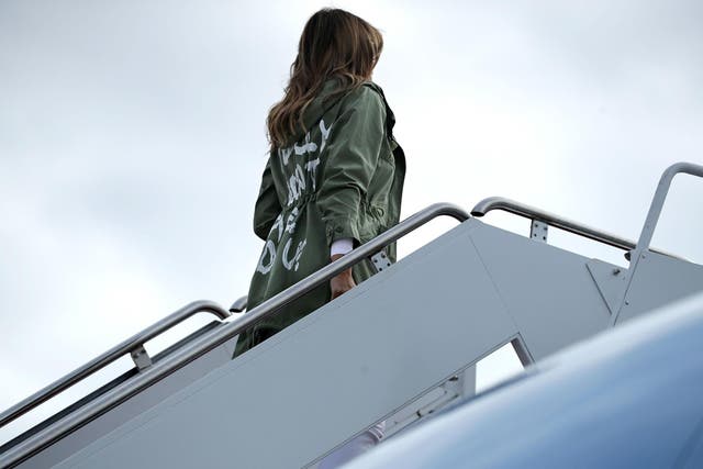 US first lady Melania Trump boards an Air Force plane before traveling to Texas to visit facilities for migrant children