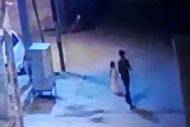 The CCTV shows the suspect and the young girl