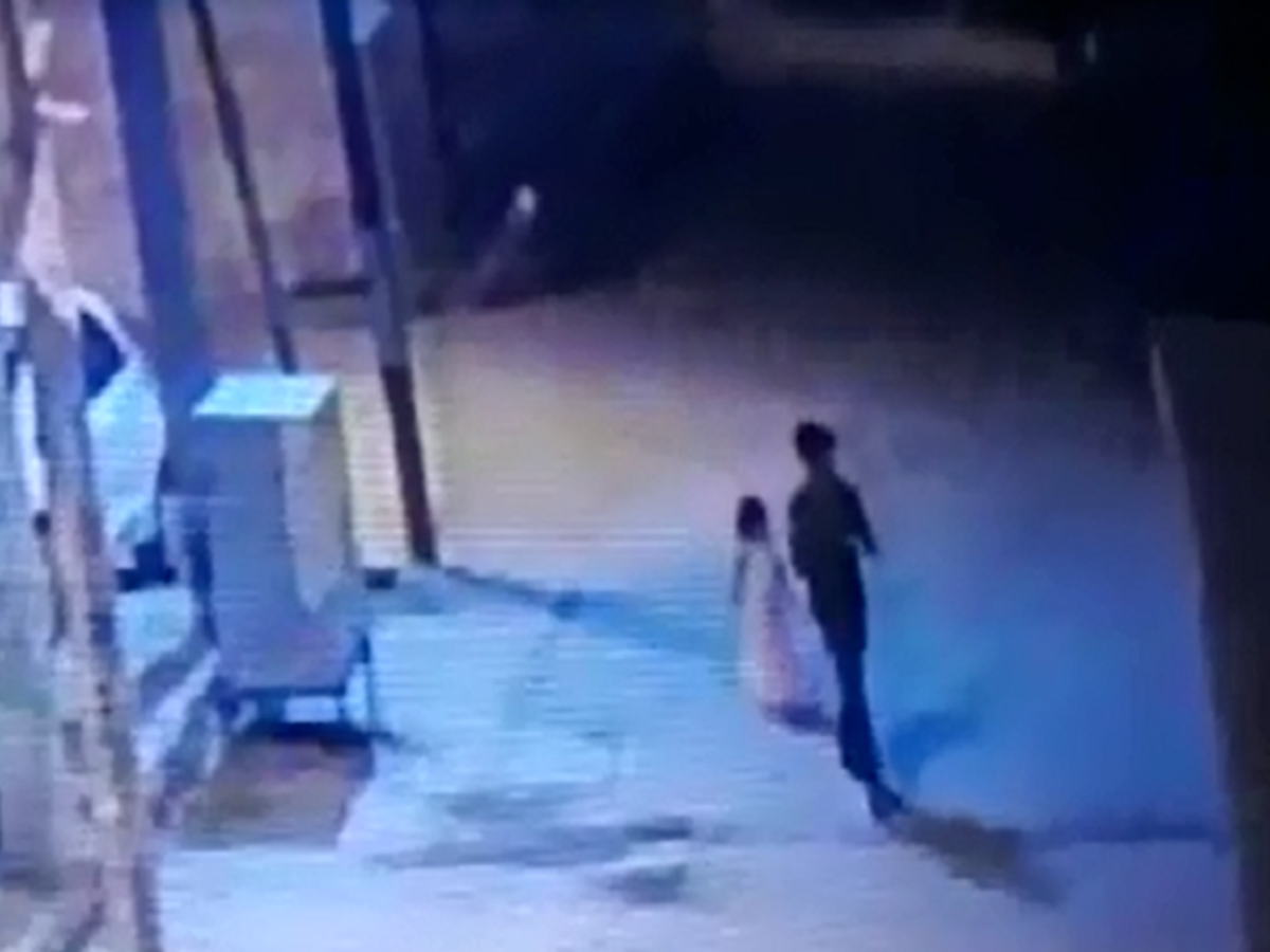 Reap Sex Vidos - Girl aged six seen on CCTV being led away to her rape and murder in India |  The Independent | The Independent