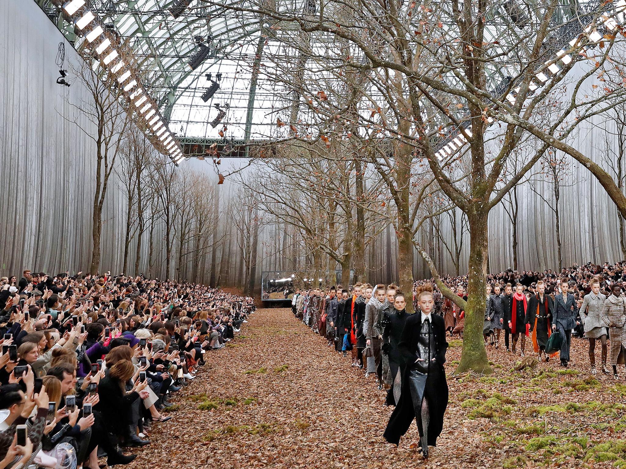 Models present creations for Chanel during the 2018/2019 fall/winter collection fashion show at the Grand Palais in Paris