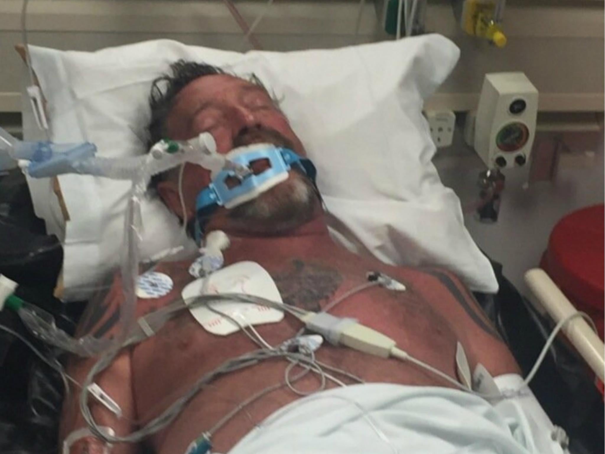 John McAfee shared pictures of him in hospital after being 'spiked'