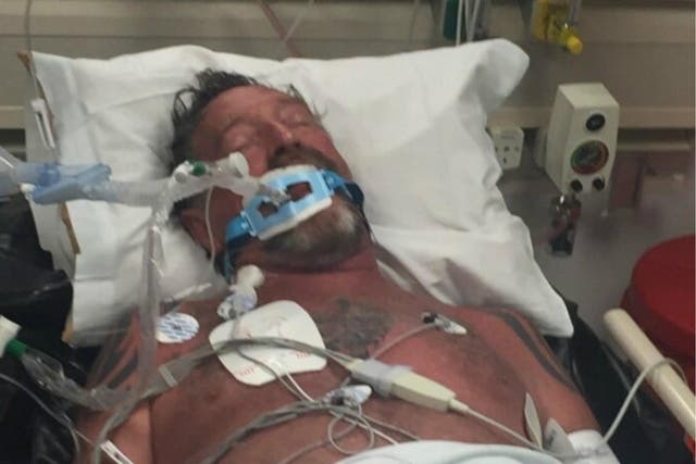John McAfee shared pictures of him in hospital after being 'spiked'