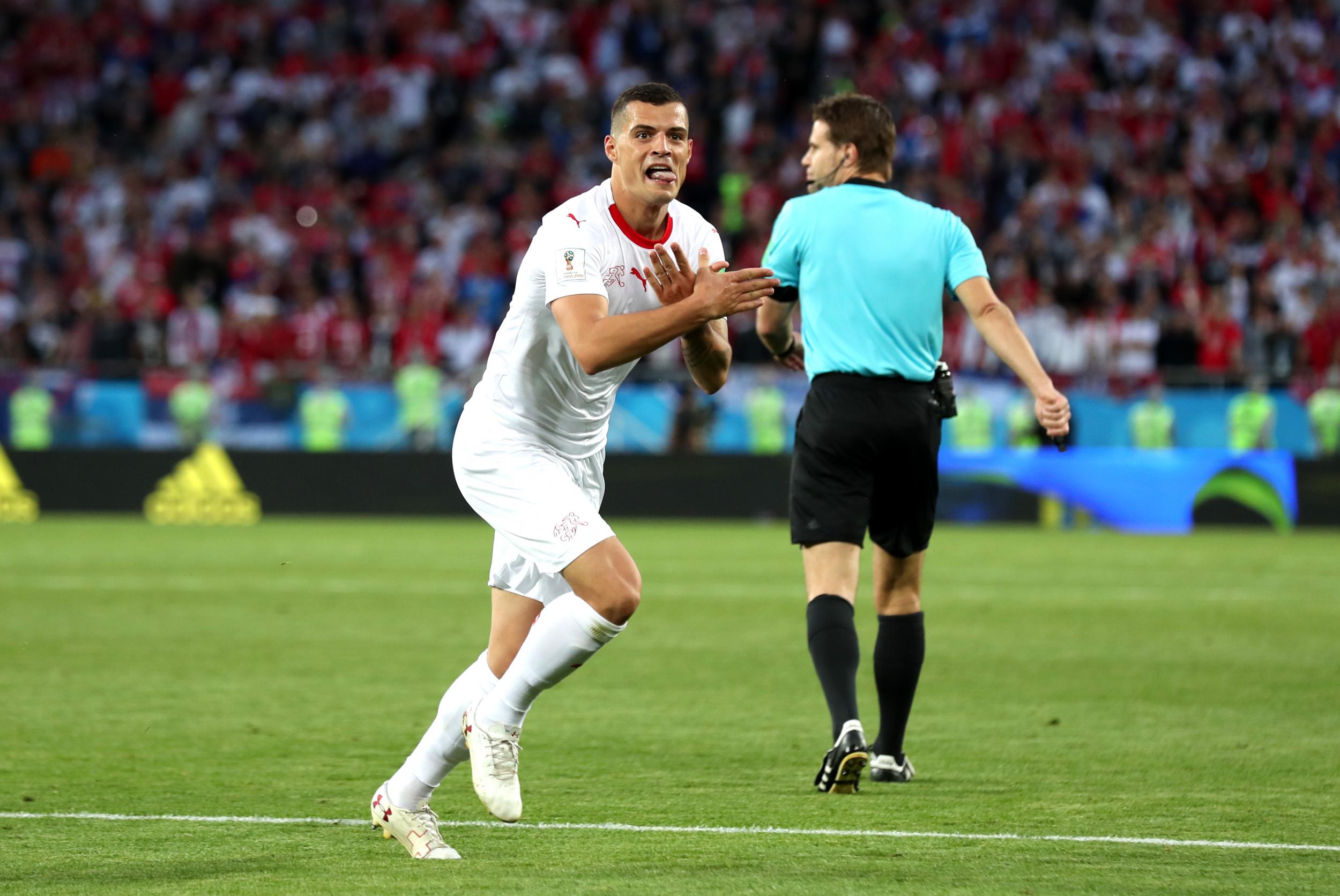 Granit Xhaka celebrates after equalising for Switzerland