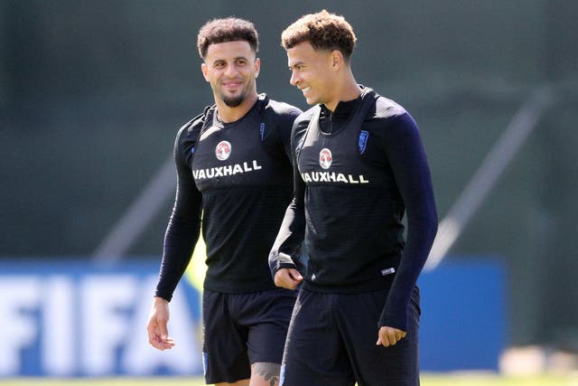 Dele Alli in training with Kyle Walker