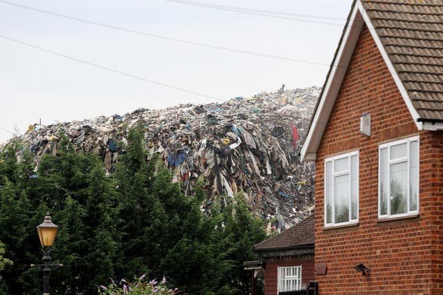 An illegal dump in Kent: despite the clear efforts of some regulators to tackle waste crime, it is more entrenched than ever