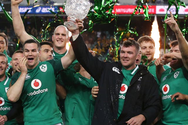Peter O'Mahony and Johnny Sexton hold up the Lansdowne Cup following Ireland's win over Australia