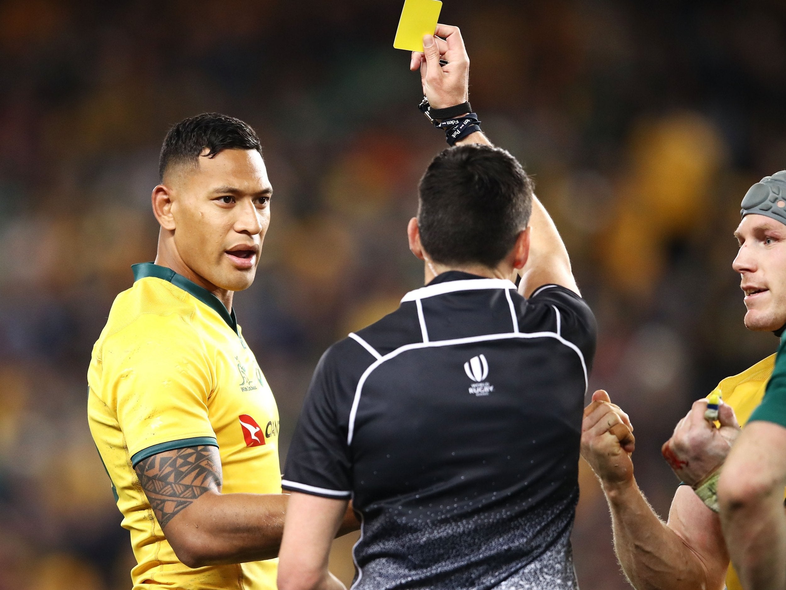 Israel Folau of the Wallabies is shown a yellow card by referee Pascal Gauzere