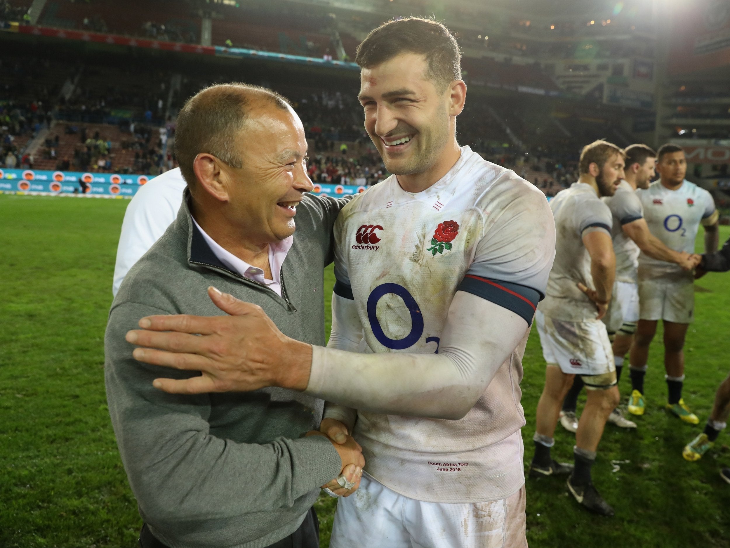 Eddie Jones embraces Jonny May after England's victory over South Africa