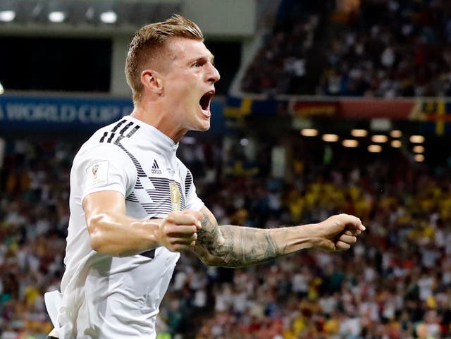 Toni Kroos celebrates after scoring Germany's winning goal against Sweden