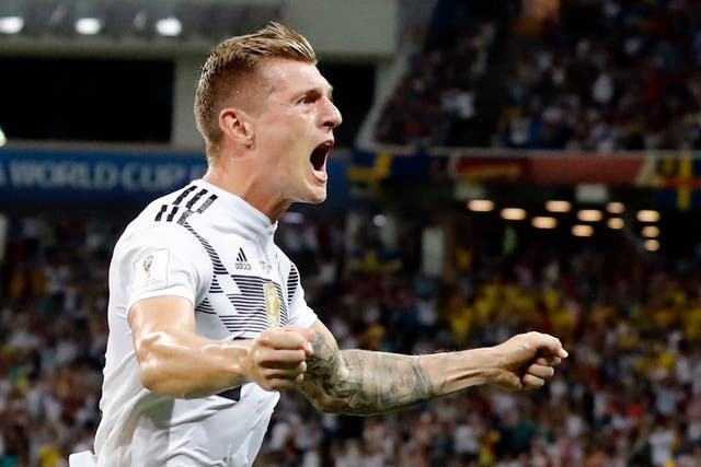Toni Kroos celebrates after scoring Germany's winning goal against Sweden