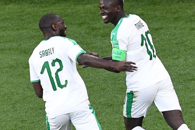 Senegal's forward Sadio Mane celebrates scoring the opening goal