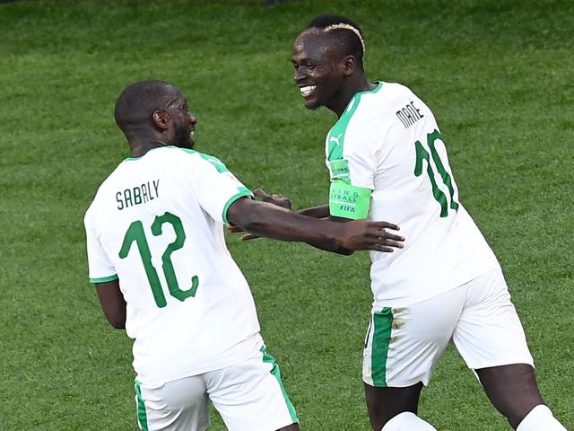 Senegal's forward Sadio Mane celebrates scoring the opening goal