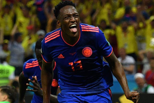 Colombia's defender Yerry Mina celebrates after scoring