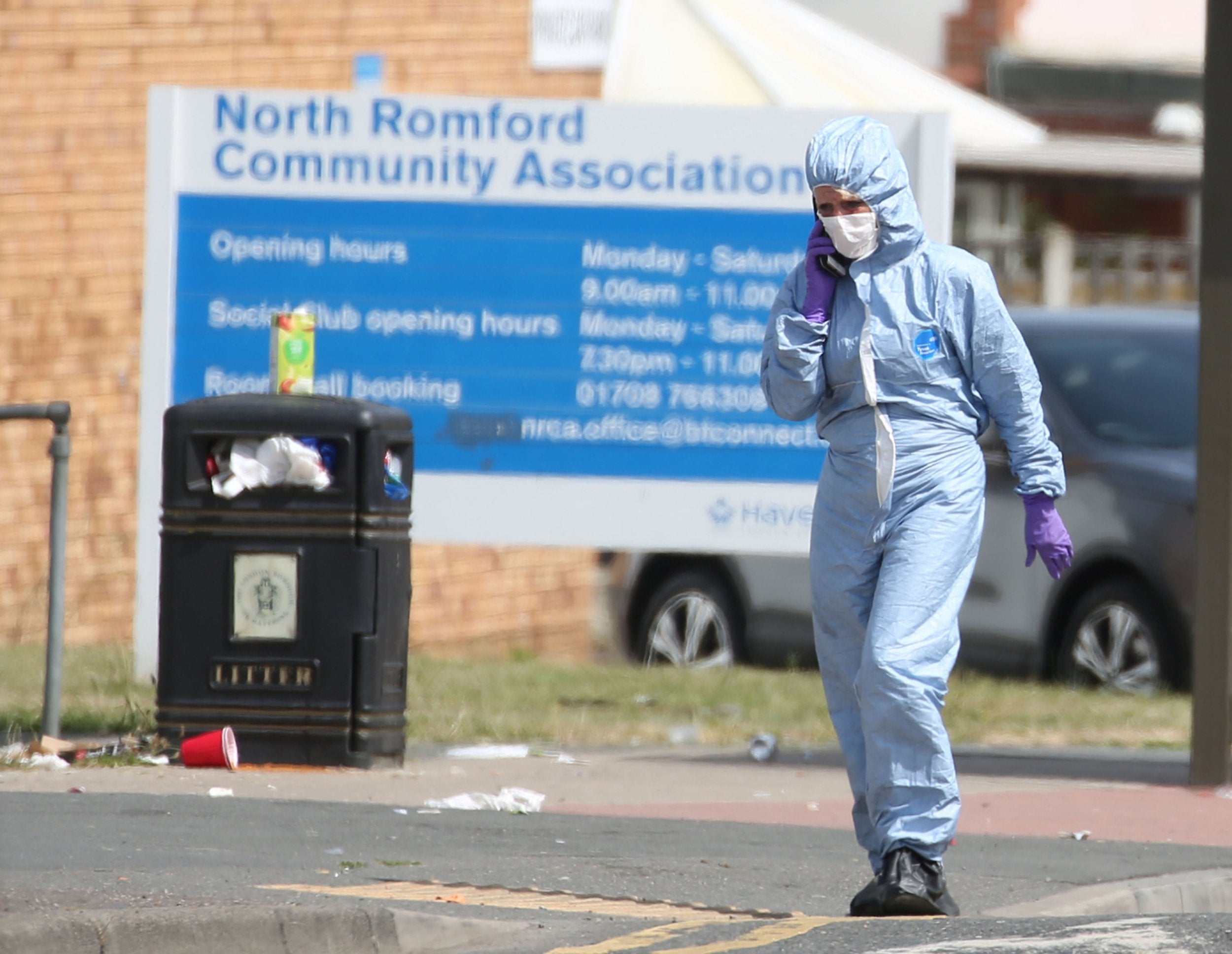 Forensic investigators at the scene of a murder where the victim was stabbed multiple times in London