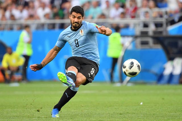 Uruguay's forward Luis Suarez shoots