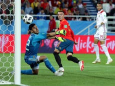 Aspas flicks Spain top of Group B with a little help from VAR