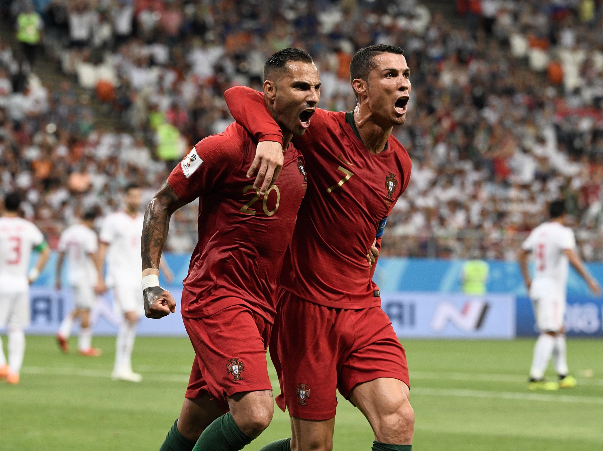 Quaresma and Ronaldo celebrate the former's fine opening goal