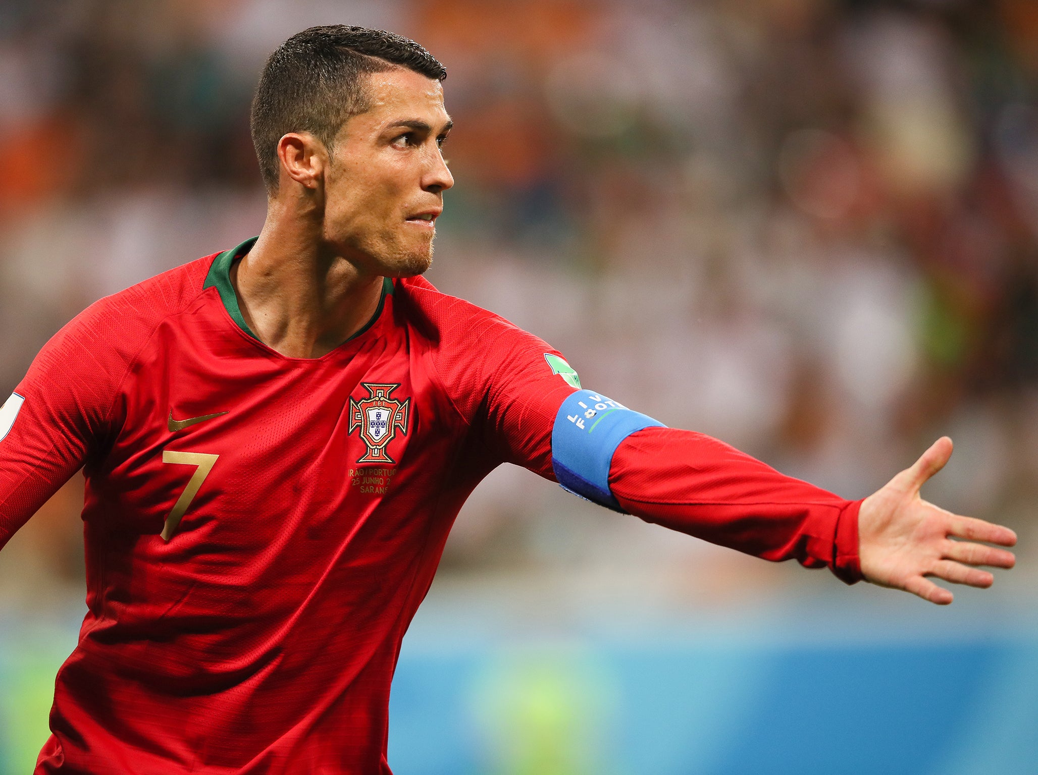 Voice of America - Cristiano Ronaldo of Portugal, left, and Lionel