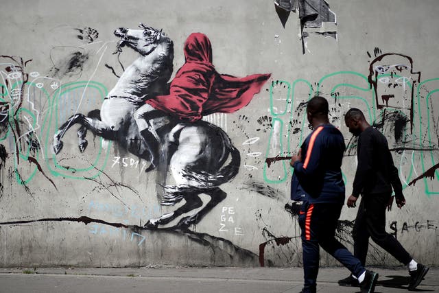 A recent artwork believed to be attributed to British activist-artist Banksy is pictured in Paris, France
