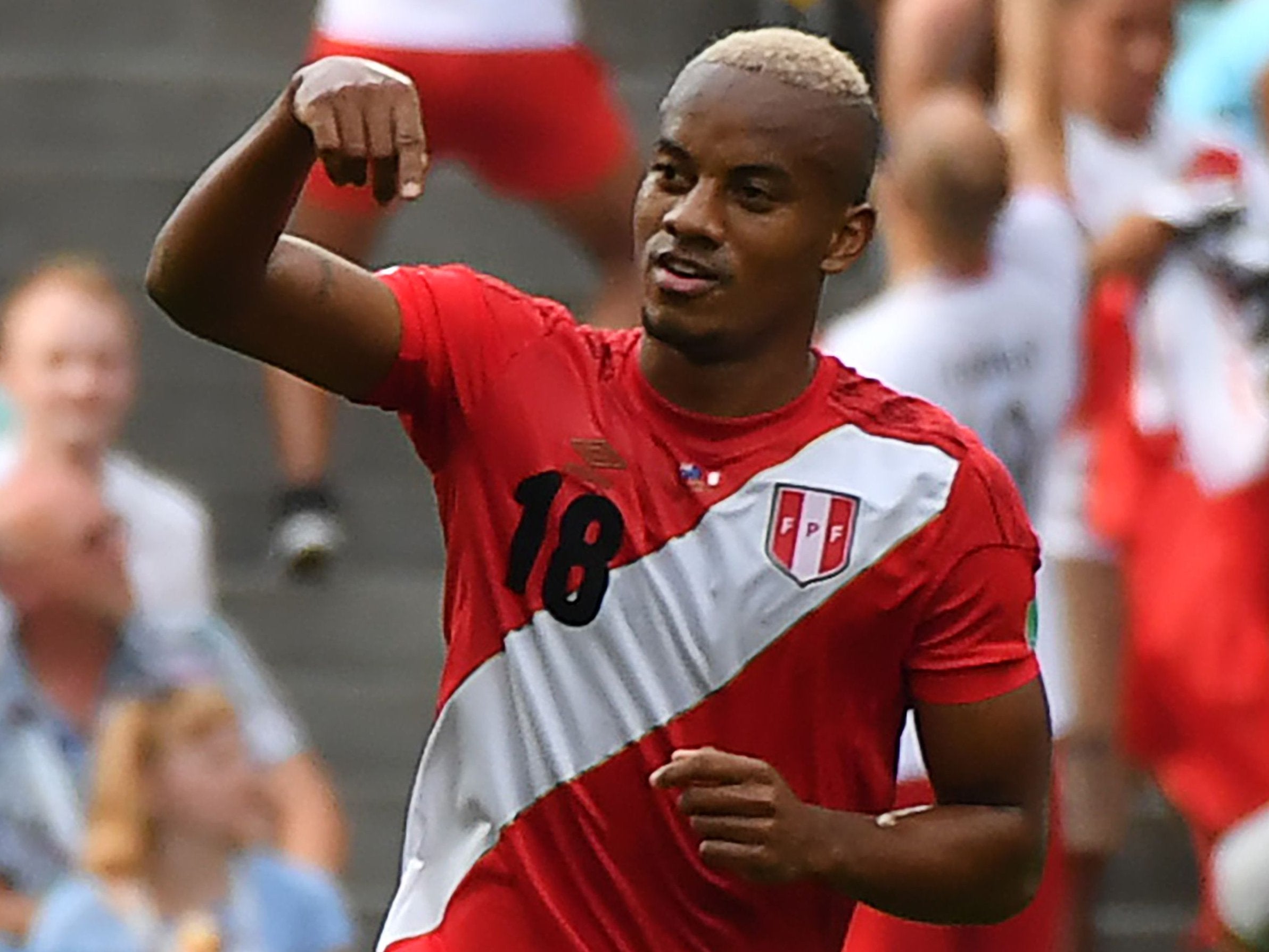 Peru's forward Andre Carrillo celebrates after scoring the opening goal