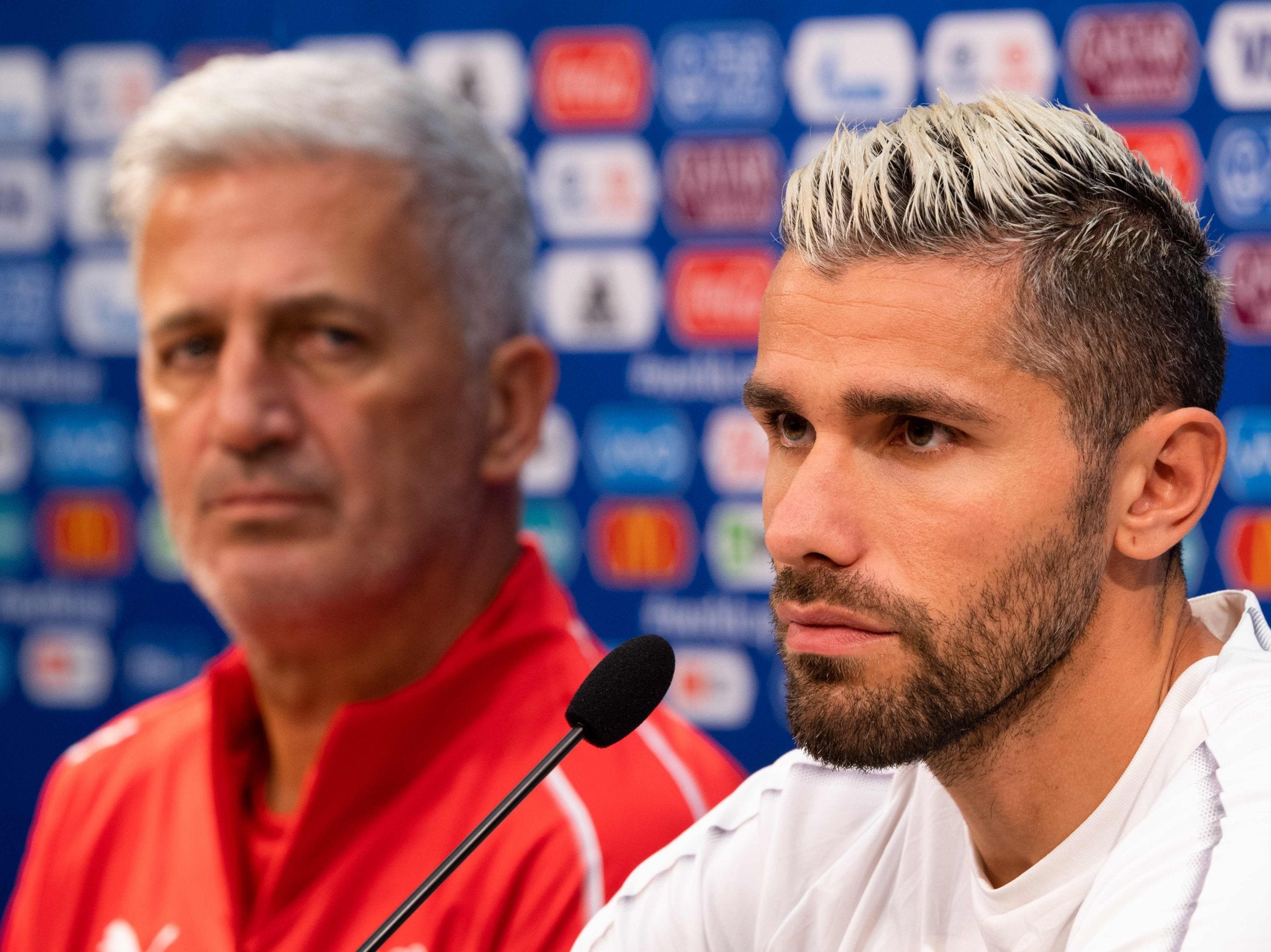 Switzerland coach Vladimir Petkovic (L) and midfielder Valon Behrami both stressed that the football should take precedent ahead of the politics