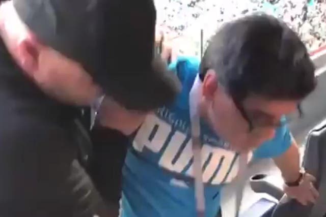 Diego Maradona had to be helped from his seat after Argentina's victory over Nigeria