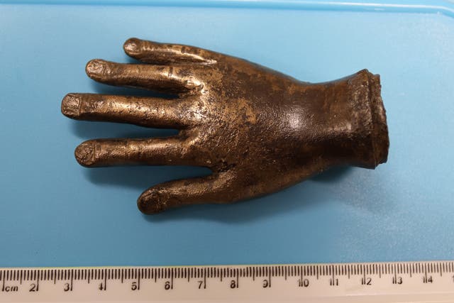 The bronze hand of the Roman god, Jupiter Dolichenus, buried 1800 years ago as a thanksgiving for Roman victory after one of the bloodiest wars ever to take place on British soil