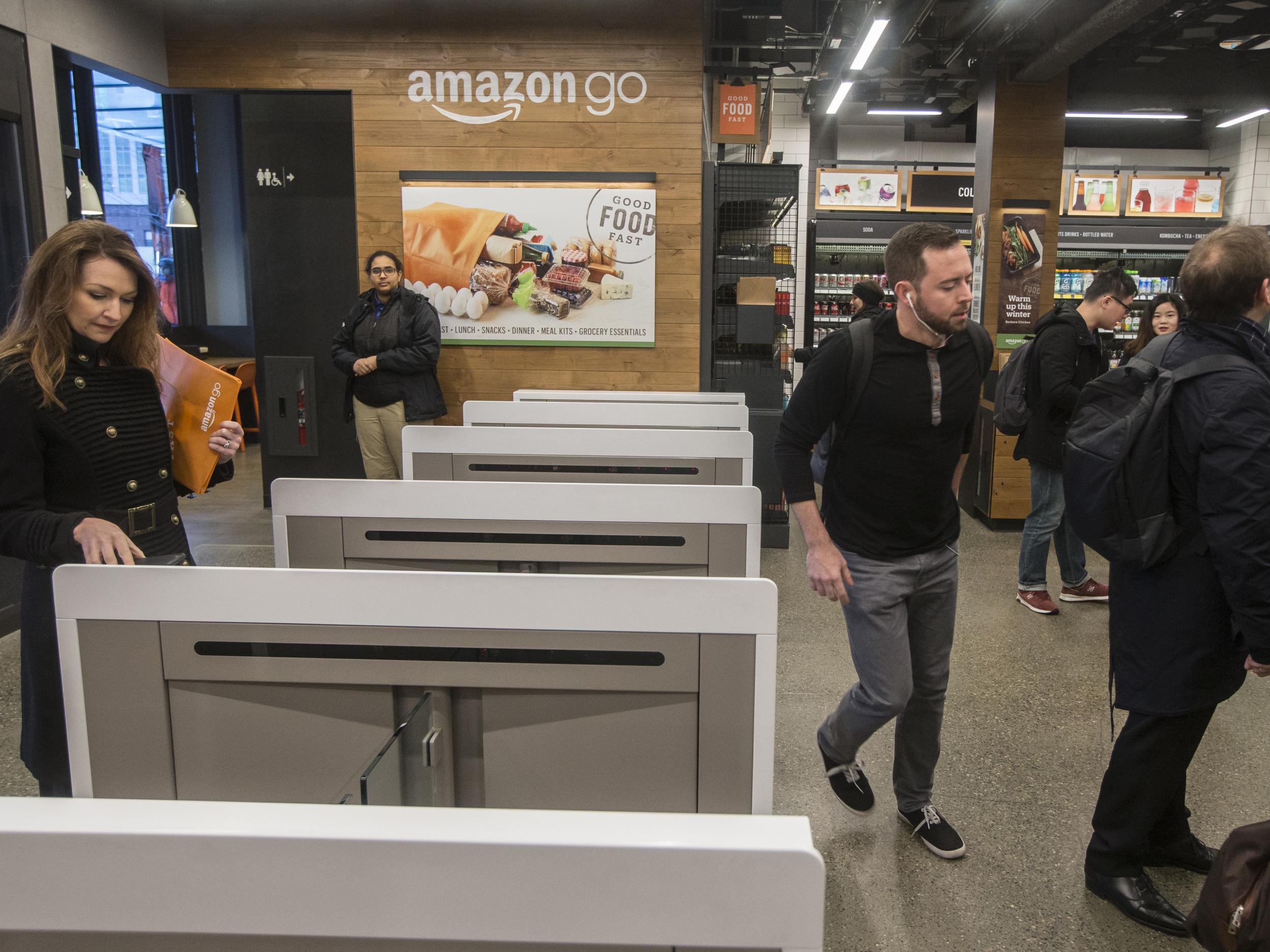 Amazon unveiled technology that will let shoppers grab shopping without having to scan and pay for them